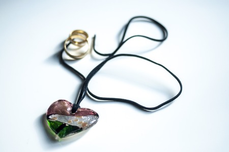 wooden magic amulet in the shape of heart. Selective focus.の写真素材