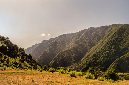 Beautiful summer landscape in mountains, green meadows and the dark blue sky with clouds . Big Caucasus. Azerbaijan. Gakh. Ilisuの写真素材