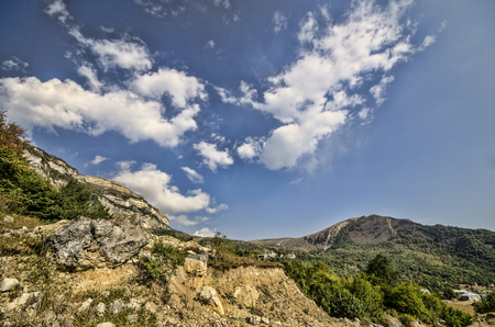 Rocky Mountains Landscape with sunny sky with clouds. Beautiful Caucasus nature. Azerbaijan Gubaの写真素材