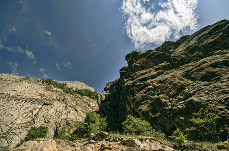 Rocky Mountains Landscape with sunny sky with clouds. Beautiful Caucasus nature. Azerbaijan Gubaの写真素材