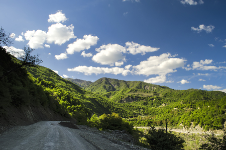 Cycling mountain road. Misty mountain road in high mountains.. Cloudy sky with mountain road. Big Caucasus. Azerbaijanの写真素材