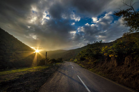 Cycling mountain road. Misty mountain road in high mountains. Cloudy sky with mountain road. Azerbaijan Talish Mountains Yardimlyの写真素材