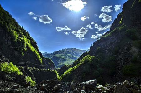 Cycling mountain road. Misty mountain road in high mountains.. Cloudy sky with mountain road. Big Caucasus. Azerbaijanの写真素材