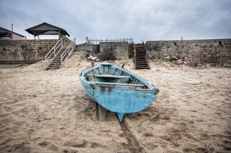 Beautiful landscape of Boat on the beach in cloudy weather. Vintage Boat in the seashore. Azerbaijan Caspian Seaの写真素材