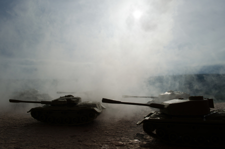 Battle Tanks moving in the desert in fog. War scene decoration. Battlefield.の写真素材