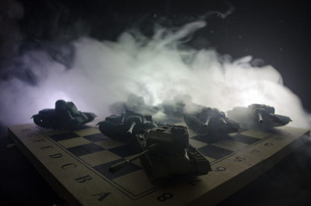Three tanks in the conflict zone. The war in the countryside. Tank silhouette at night. Battle scene. War conceptの写真素材