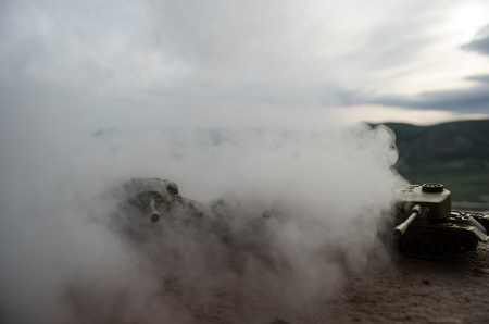 Battle Tanks moving in the desert in fog. War scene decoration. Battlefield.の写真素材
