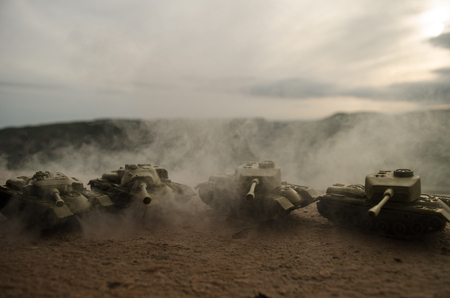 Battle Tanks moving in the desert in fog. War scene decoration. Battlefield.の写真素材