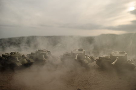 Battle Tanks moving in the desert in fog. War scene decoration. Battlefield.の写真素材