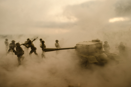 Battle Tanks moving in the desert in fog. War scene decoration. Battlefield.の写真素材