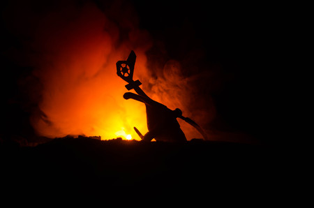 Air Crash. Burning falling helicopter. Destroyed helicopter. Decorated with toy at dark fire backgroundの写真素材