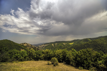 Majestic cloudy mountains landscape. Dramatic sky clouds. Azerbaijan, Big Caucasus mountains.の写真素材
