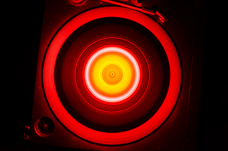 Concept of speed - Trail of fire and smoke - Vinyl record. Burning vinyl disk. Turntable vinyl record player. Retro audio equipment for disc jockey. Sound technologyの写真素材