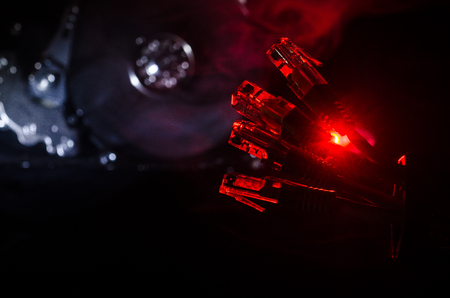 Network switch and ethernet cables, symbol of global communications. Colored network cables on dark background with lights and smoke. Selective focus. Network internet concept backgroundの写真素材