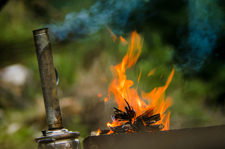 Bonfire in spring forest, close-up. Selective focus, Camping conceptの写真素材