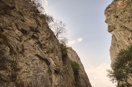 amazing landscape of rocky mountains and blue sky . Sky view between two rocks. Big Caucasus mountains. Xinaliq Guba Azerbaijanの写真素材