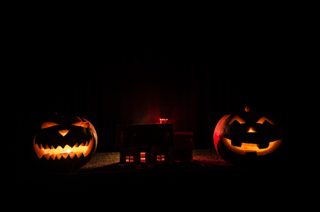Apocalyptic Halloween scenery with old house pumpkin. Horror zombie near the abandoned houseの写真素材