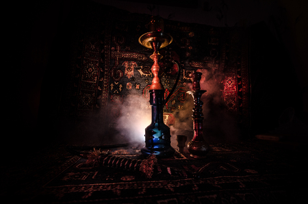 Hookah hot coals on shisha bowl with black background. Stylish oriental shisha. Shisha Concept
