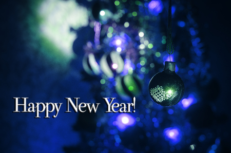 Christmas Toy on the Christmas tree. New Year ornaments winter background for postcard empty space. New Year eve background - glass Christmas toy. Greeting cardの写真素材