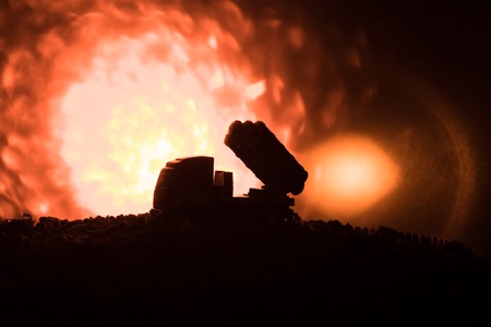 Rocket launch with fire clouds. Battle scene with rocket Missiles with Warhead Aimed at Gloomy Sky...