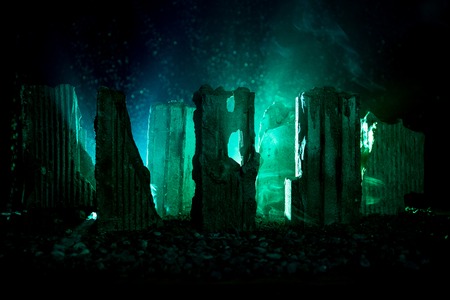Apocalyptic ruins of the city. Disaster effect. Night scene. City destroyed by war. Destroyed skyscrapersの写真素材
