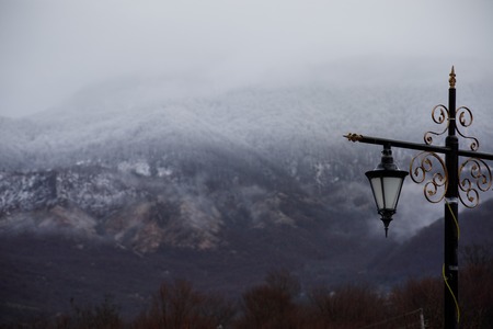 Panorama of the foggy winter landscape in the mountains with snow and rocks, Beautiful landscape of winter nature of Azerbaijan, Lahic, Big Caucasusの写真素材
