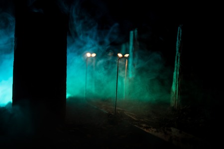 Empty street of burnt up city, flames on the ground and blasts with smoke in the distance....