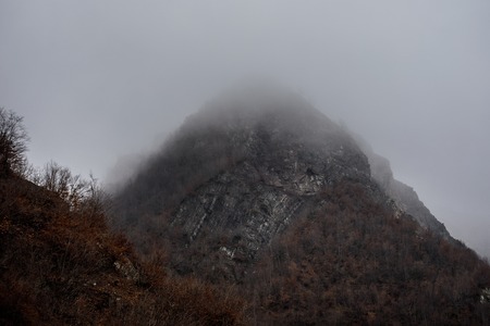 Panorama of the foggy winter landscape in the mountains with snow and rocks, Beautiful landscape of...