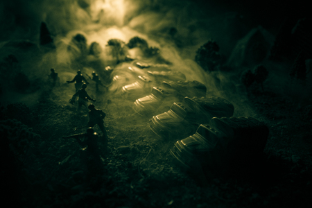 War Concept. Military silhouettes fighting scene on war fog sky background, World War Soldiers...