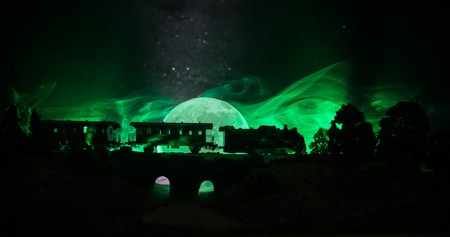 Train moving in fog. Ancient steam locomotive in night. Night train moving on railroad. toned foggy...