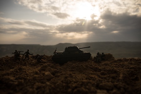 War Concept. Military silhouettes fighting scene on war fog sky background, World War Soldiers...