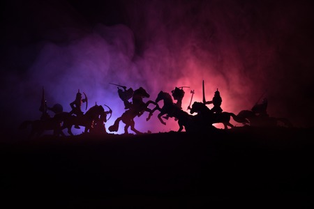 Medieval battle scene with cavalry and infantry. Silhouettes of figures as separate objects, fight...