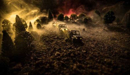 War Concept. Military silhouettes fighting scene on war fog sky background, World War Soldiers...