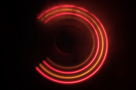 Music concept. Freezelight glowing vinyl on dark background or Turntable playing vinyl with glowing abstract lines concept on dark background. For Club poster Designの写真素材