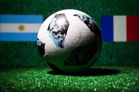 BAKU,AZERBAIJAN - JUNE 29, 2018 : Creative concept. Official Russia 2018 World Cup football ball The Adidas Telstar 18 on green grass Support your country or cheer concept. Selective focusのeditorial素材