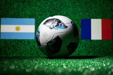 BAKU,AZERBAIJAN - JUNE 29, 2018 : Creative concept. Official Russia 2018 World Cup football ball The Adidas Telstar 18 on green grass Support your country or cheer concept. Selective focusのeditorial素材