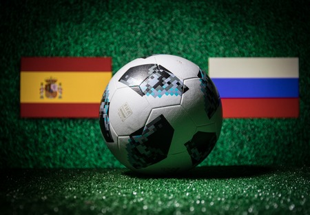 BAKU,AZERBAIJAN - JUNE 29, 2018 : Creative concept. Official Russia 2018 World Cup football ball The Adidas Telstar 18 on green grass Support your country or cheer concept. Selective focusのeditorial素材