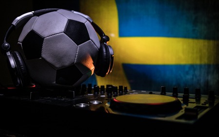 Soccer 2018 club party concept. Close up view of dj deck with selective focus. Useful as club poster, empty space.の写真素材