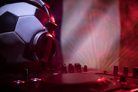 Soccer 2018 club party concept. Close up view of dj deck with selective focus. Useful as club poster, empty space.の写真素材