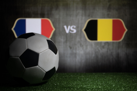 Soccer 2018. Creative concept. Soccer ball on green grass. France and Belgium. Selective focusの写真素材