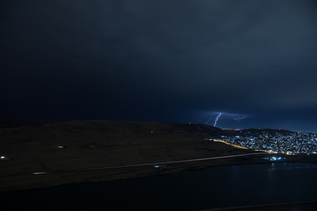 Summer storm bringing thunder, lightnings and rain. Baku. Azerbaijanの写真素材
