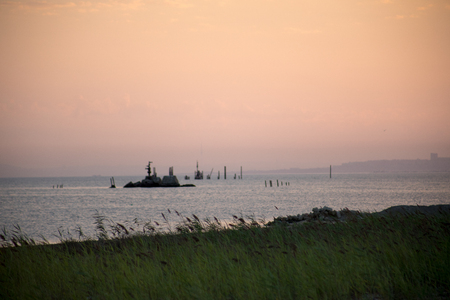 Amazing view of clear sea landscape with cloudy sky as a background Sunset time. Baku, Azerbaijan