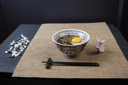 Close up view of plate with japanese food inside. Japan traditional food on wooden table.の写真素材