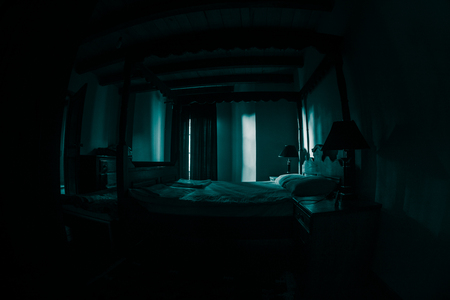 A creepy bedroom scenery, Antique scary bedroom with window . Dark room. Horror concept