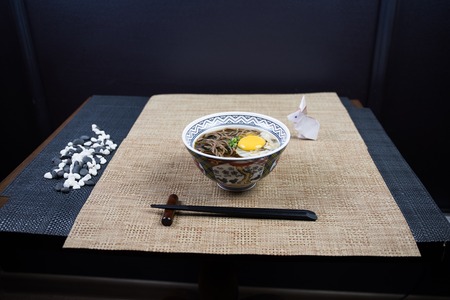 Close up view of plate with japanese food inside. Japan traditional food on wooden table.の写真素材