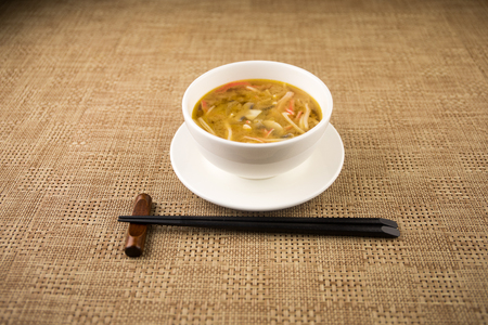 Close up view of plate with japanese food inside. Japan traditional food on table with eastern decor. Selective focusの写真素材