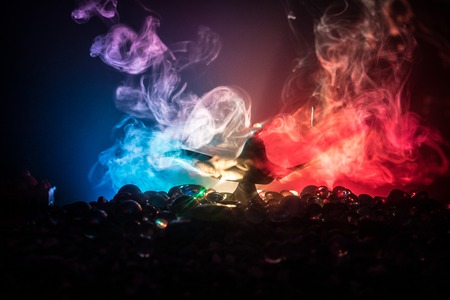 Antique Aladdin arabian nights genie style oil lamp with soft light white smoke, Dark background. Lamp of wishes conceptの写真素材