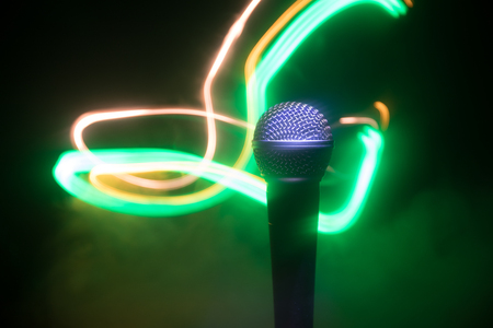 Microphone for sound, music, karaoke in audio studio or stage. Mic technology. Voice, concert entertainment background. Speech broadcast equipment. Live pop, rock musical performanceの写真素材