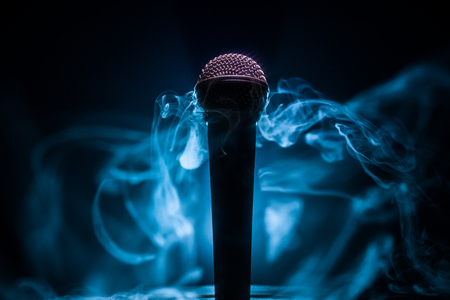 Microphone for sound, music, karaoke in audio studio or stage. Mic technology. Voice, concert entertainment background. Speech broadcast equipment. Live pop, rock musical performanceの写真素材