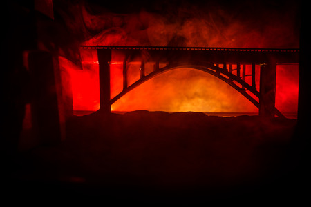 Apocalyptic ruins of the city. Disaster effect. Night scene. City destroyed by war. Destroyed skyscrapers Abandoned bridge. Artwork decorationの写真素材